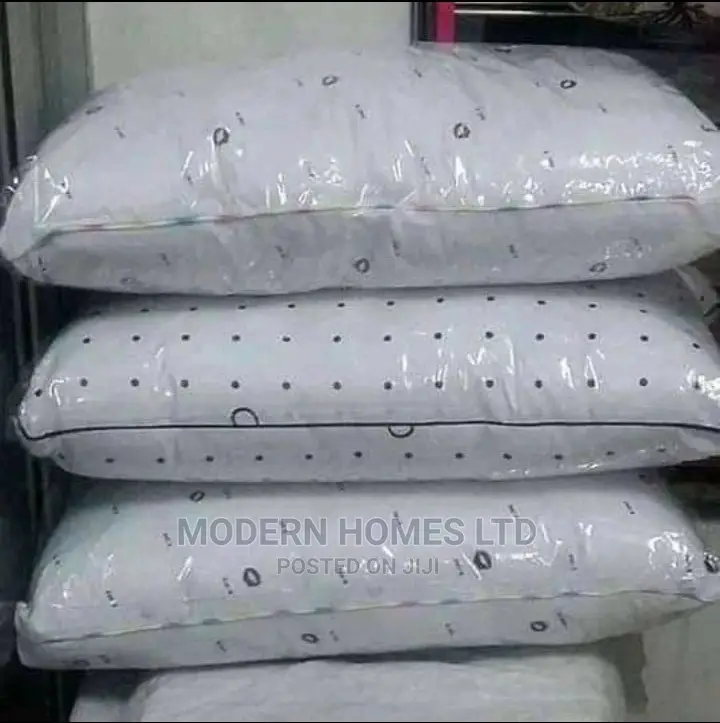 A Pair Of Pillows And Waterproof Pillow Protectors