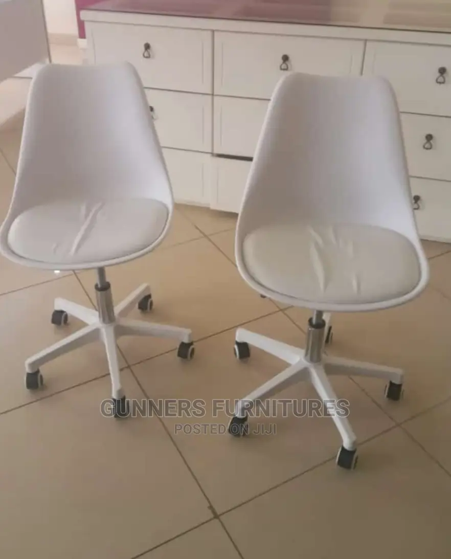 Padded Eames Chairs.