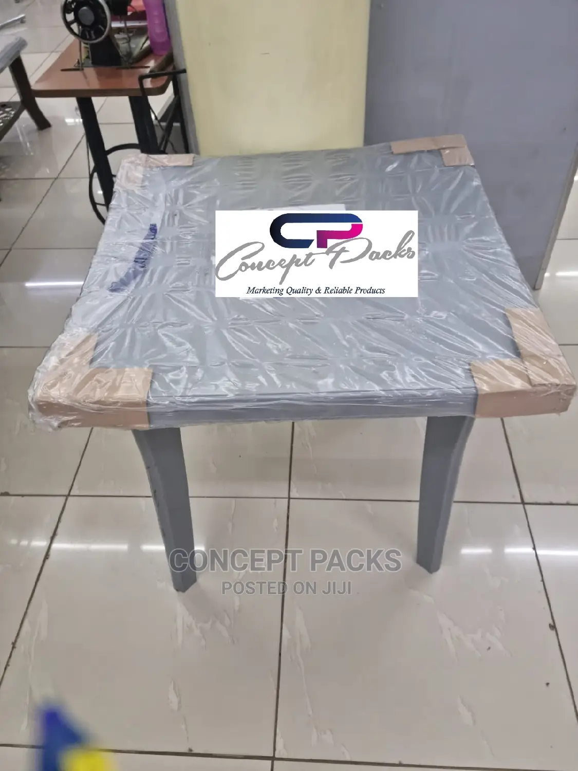 Grey Plastic Square Table.