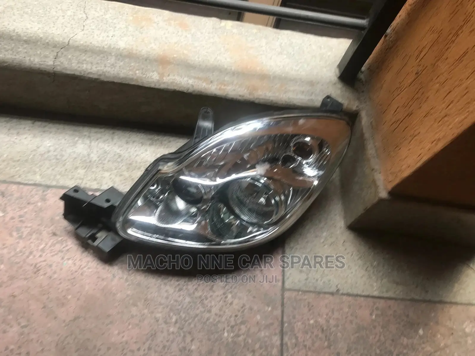 Mazda Verisa Headlight