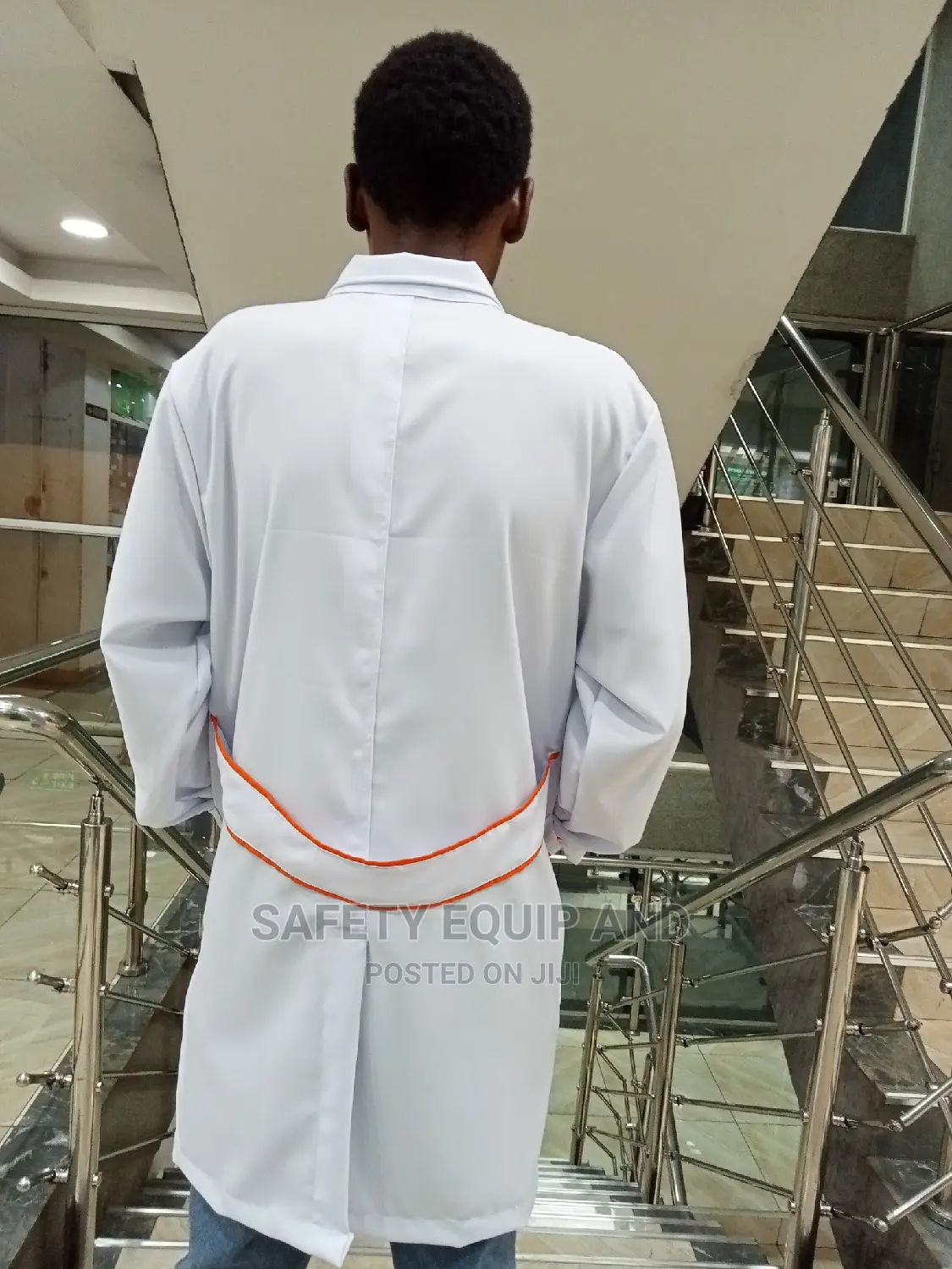 White Dustcoats With Orange Piping