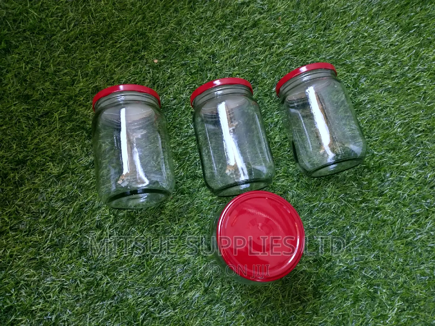 A Set of 4 Storage Jars 720ml With Airtight Red Lids