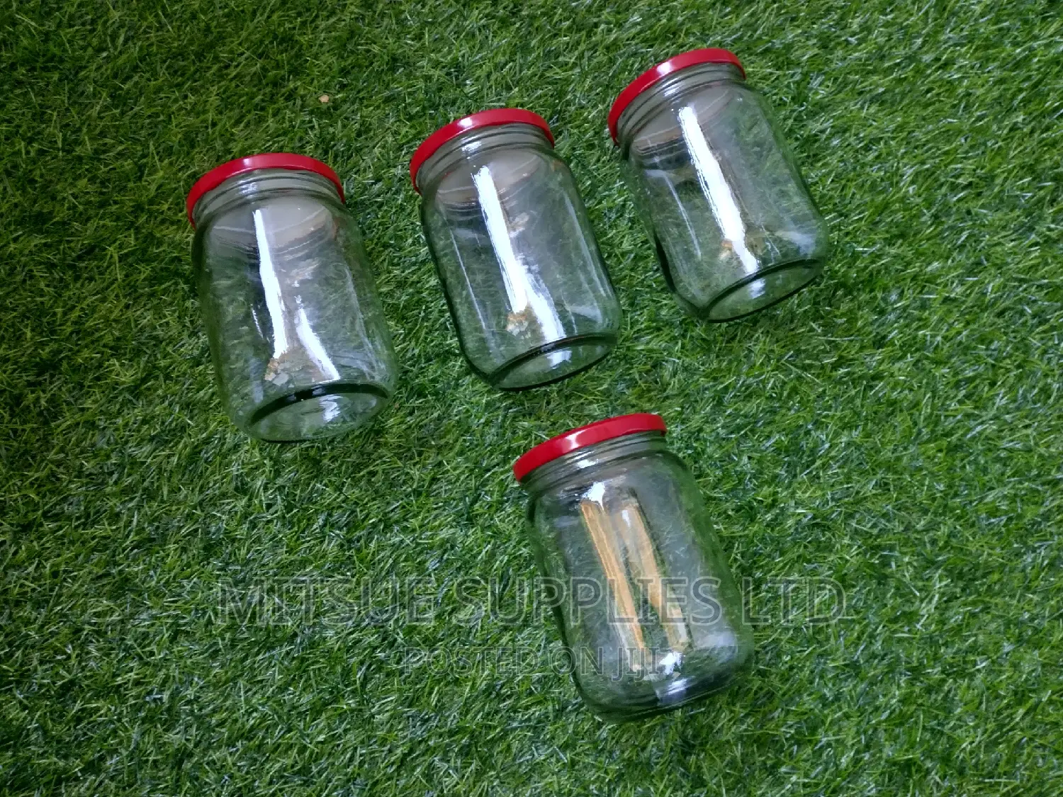 A Set of 4 Storage Jars 720ml With Airtight Red Lids