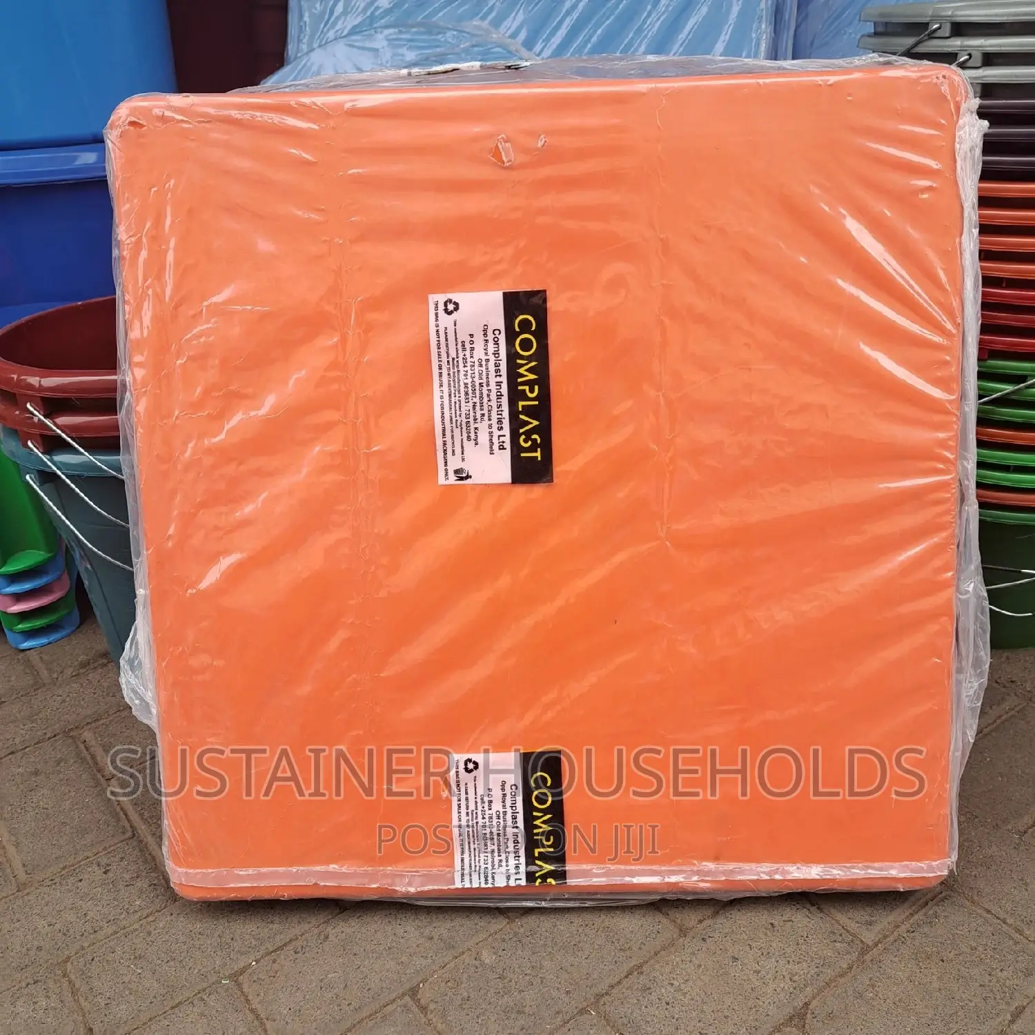 Orange Plastic Table With Metal Tubing Legs