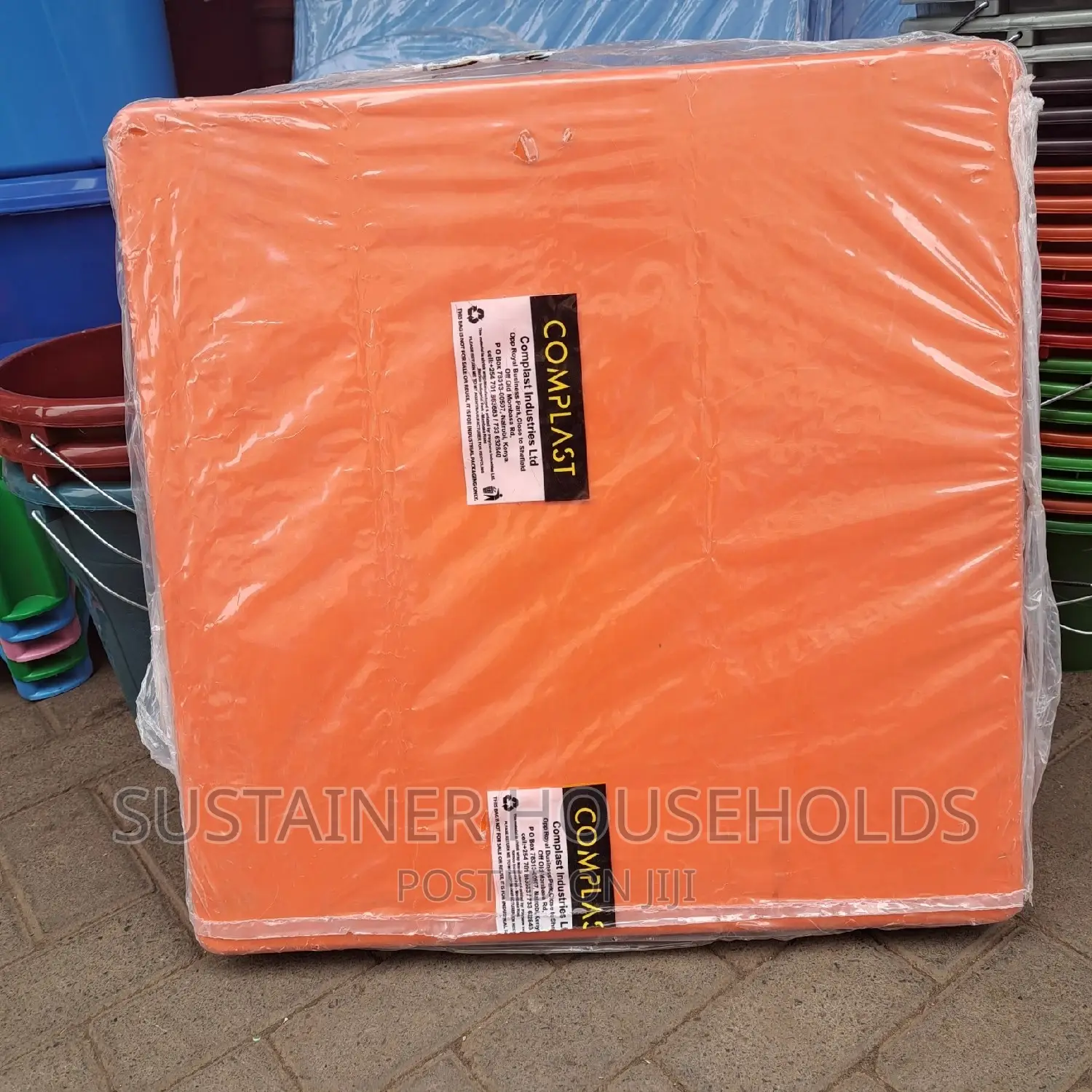 Orange Plastic Table With Metal Tubing Legs