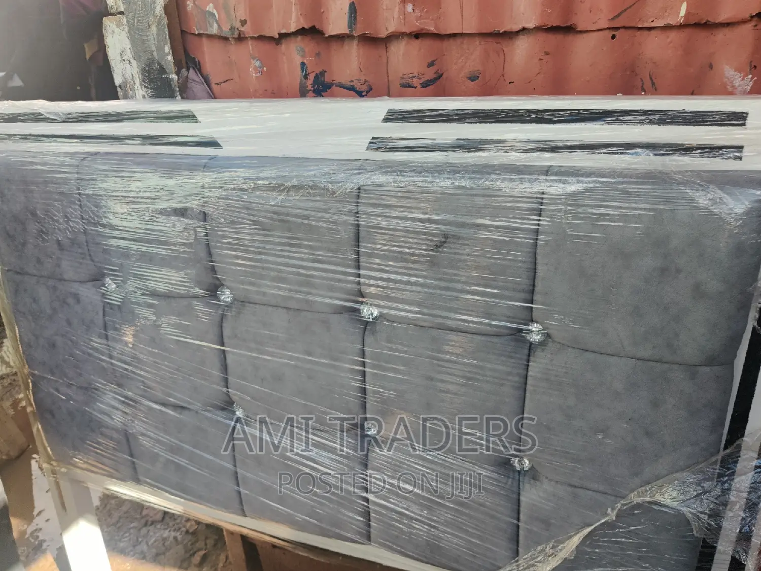 Grey Tufted Bed