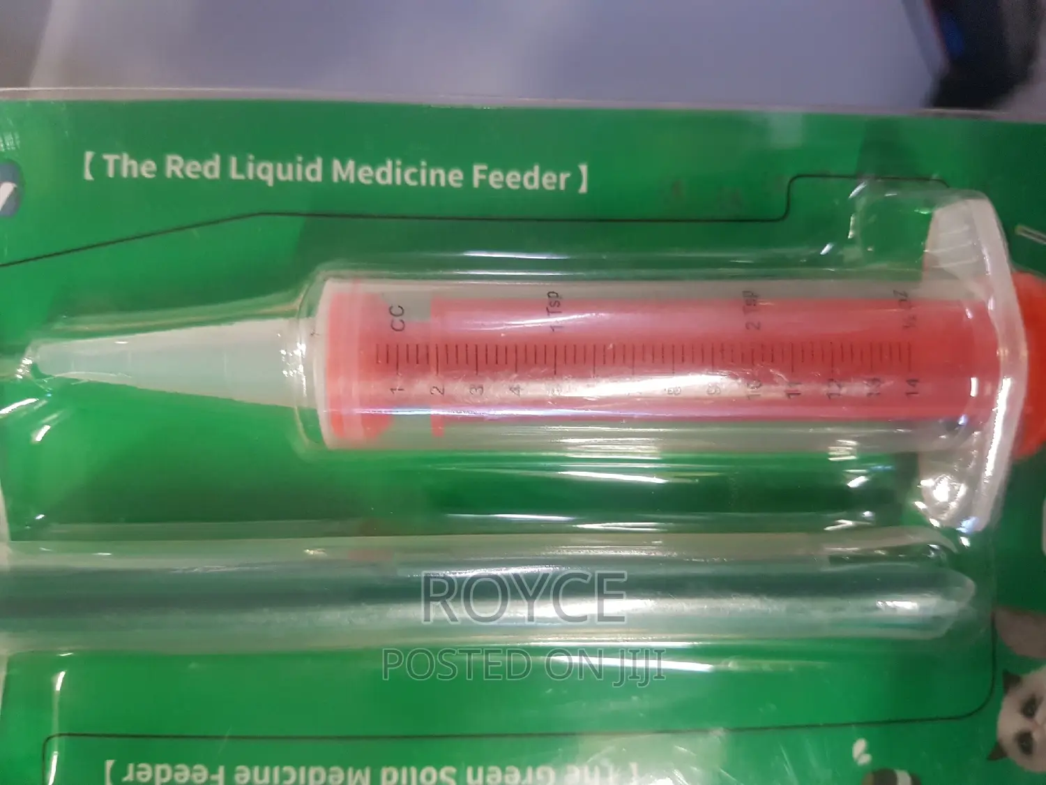 The Red Liquid Medicine Feeder