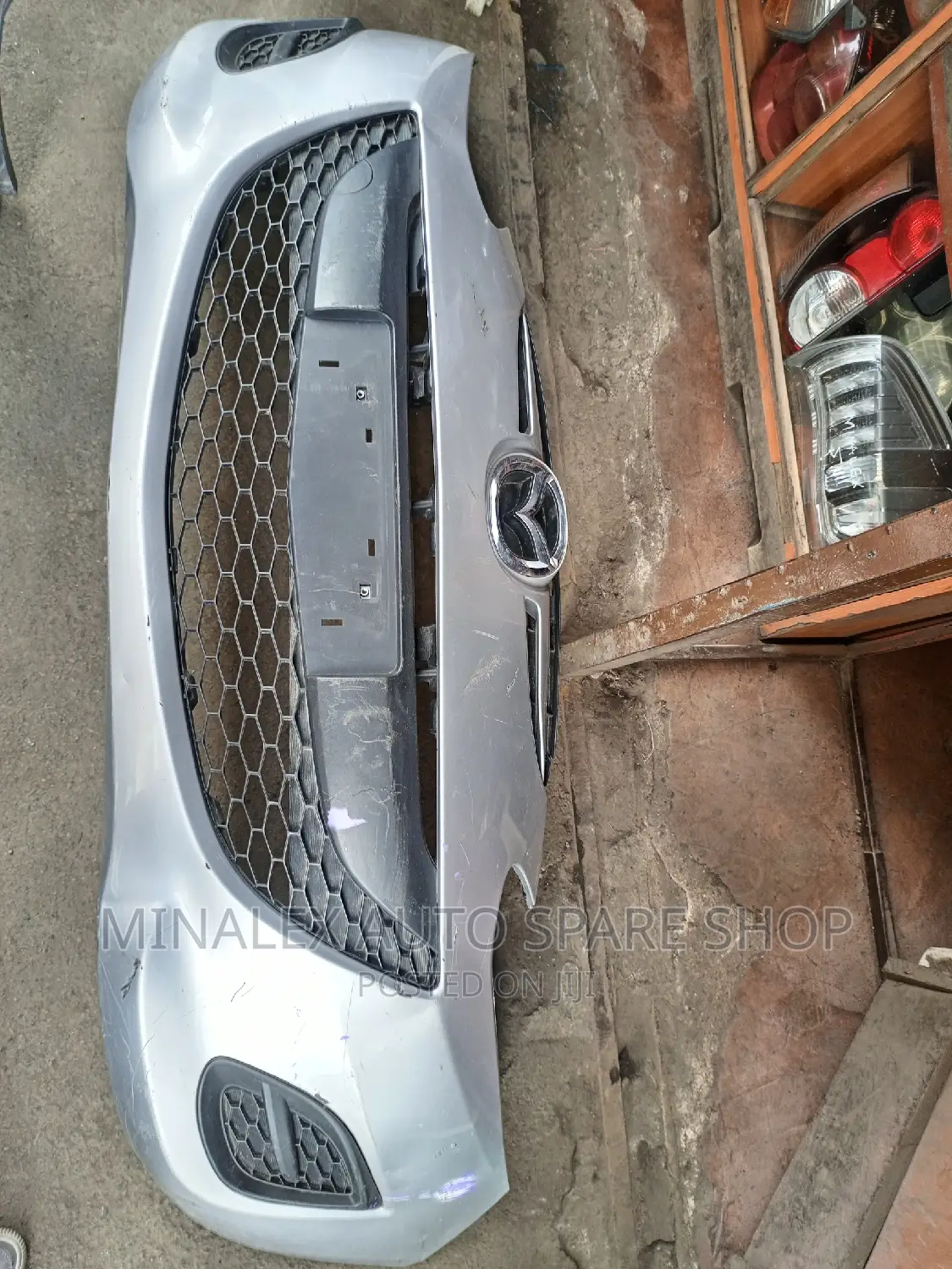 Mazda Demio 2010-2012 Front Bumper With Both Grills Cove