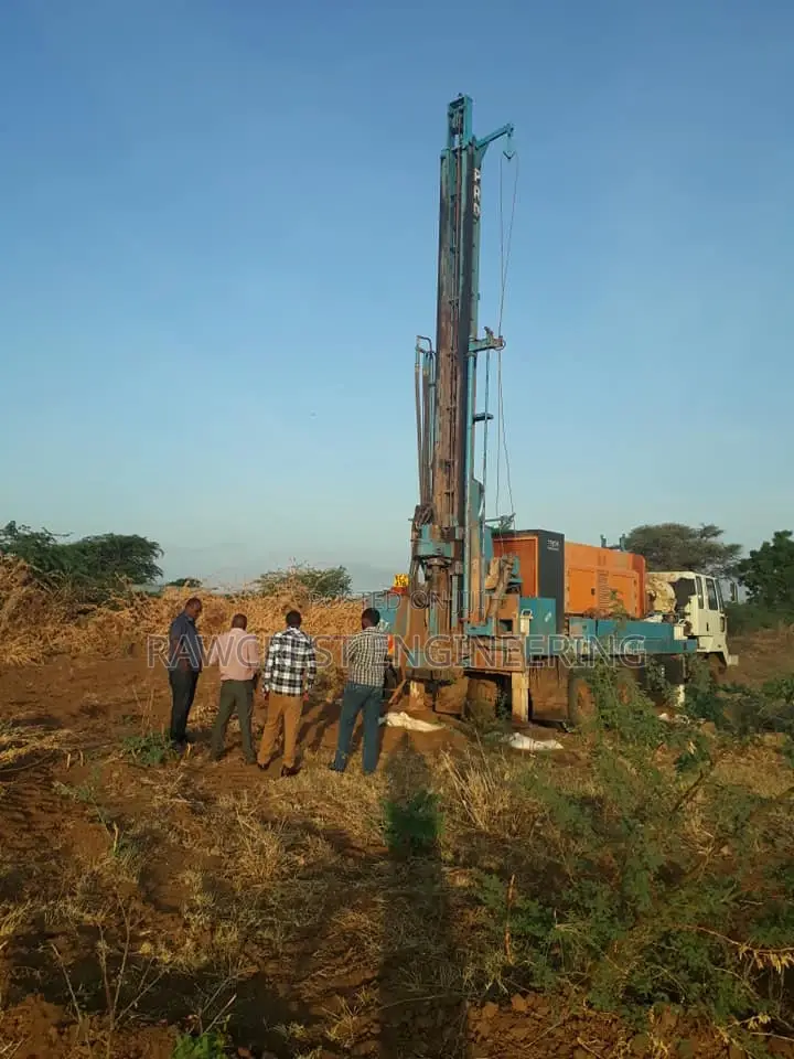 Water Drilling and Steel Tank Installation