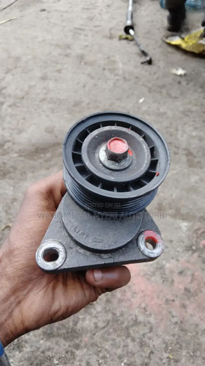Tensioner Mazda Premacy