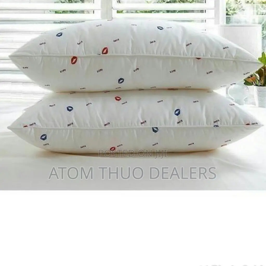 A Pair of White Fibre Pillows