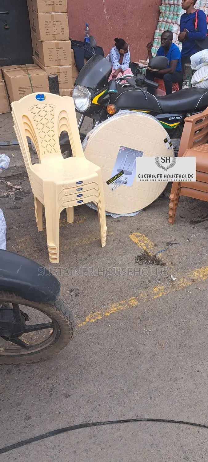 Quality Plastic Chairs and a Table Set