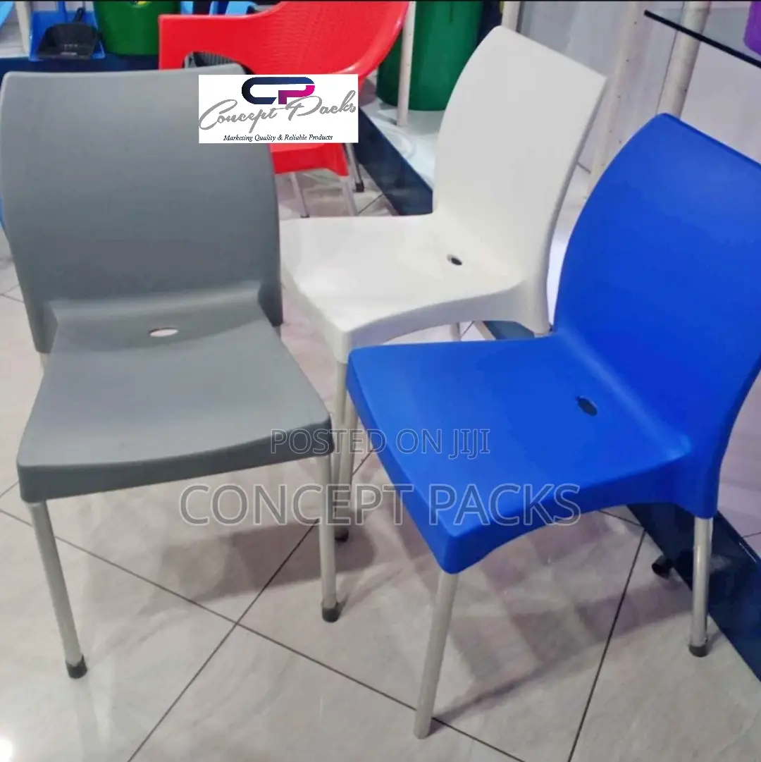Armless Plastic Chair With Metal Tubing Legs.