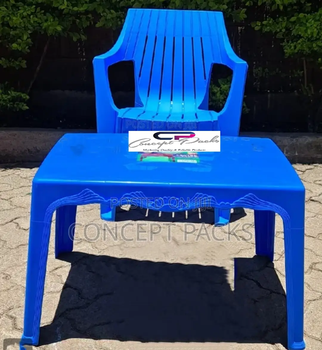 Long Arm Chair + Small Plastic Coffee Table.