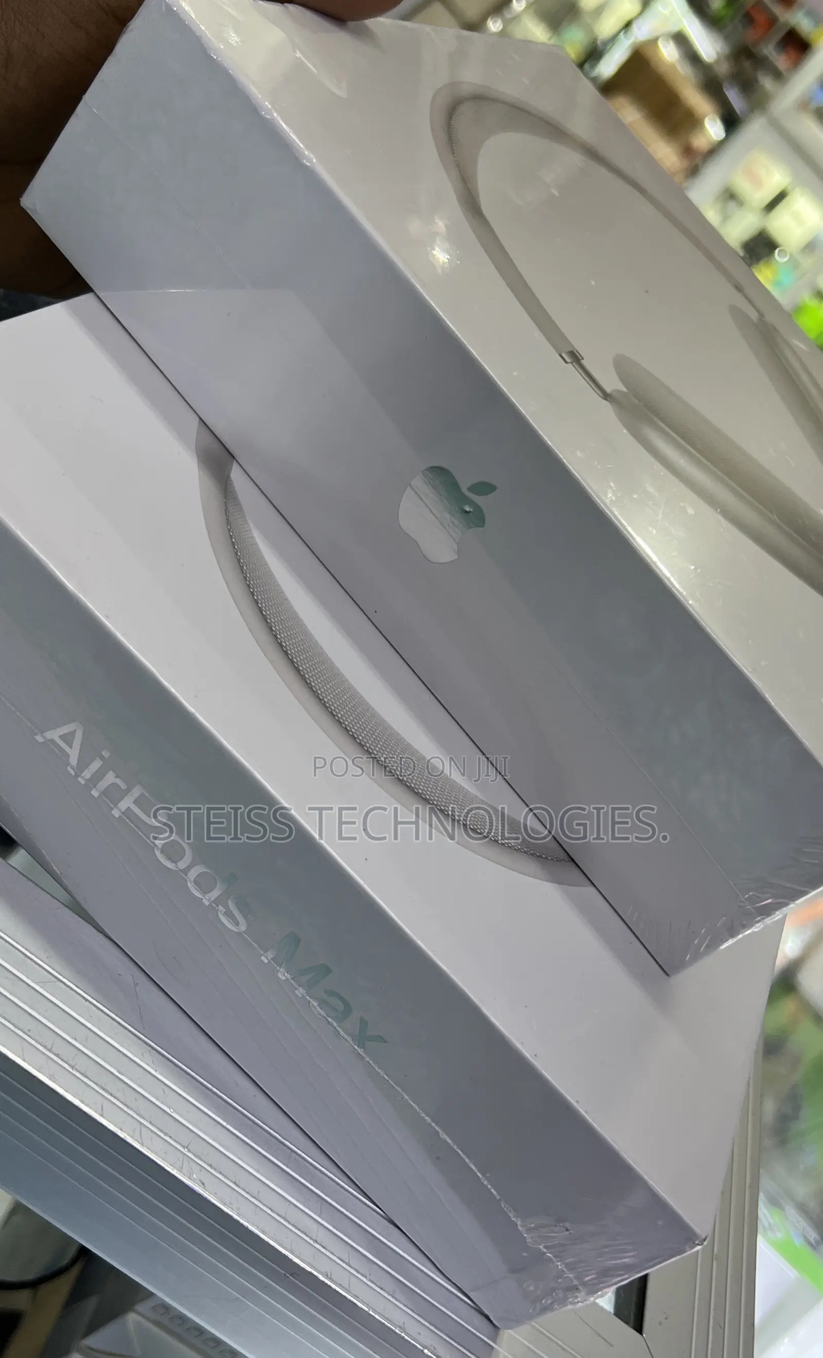 White/Silver Apple Airpods Max.