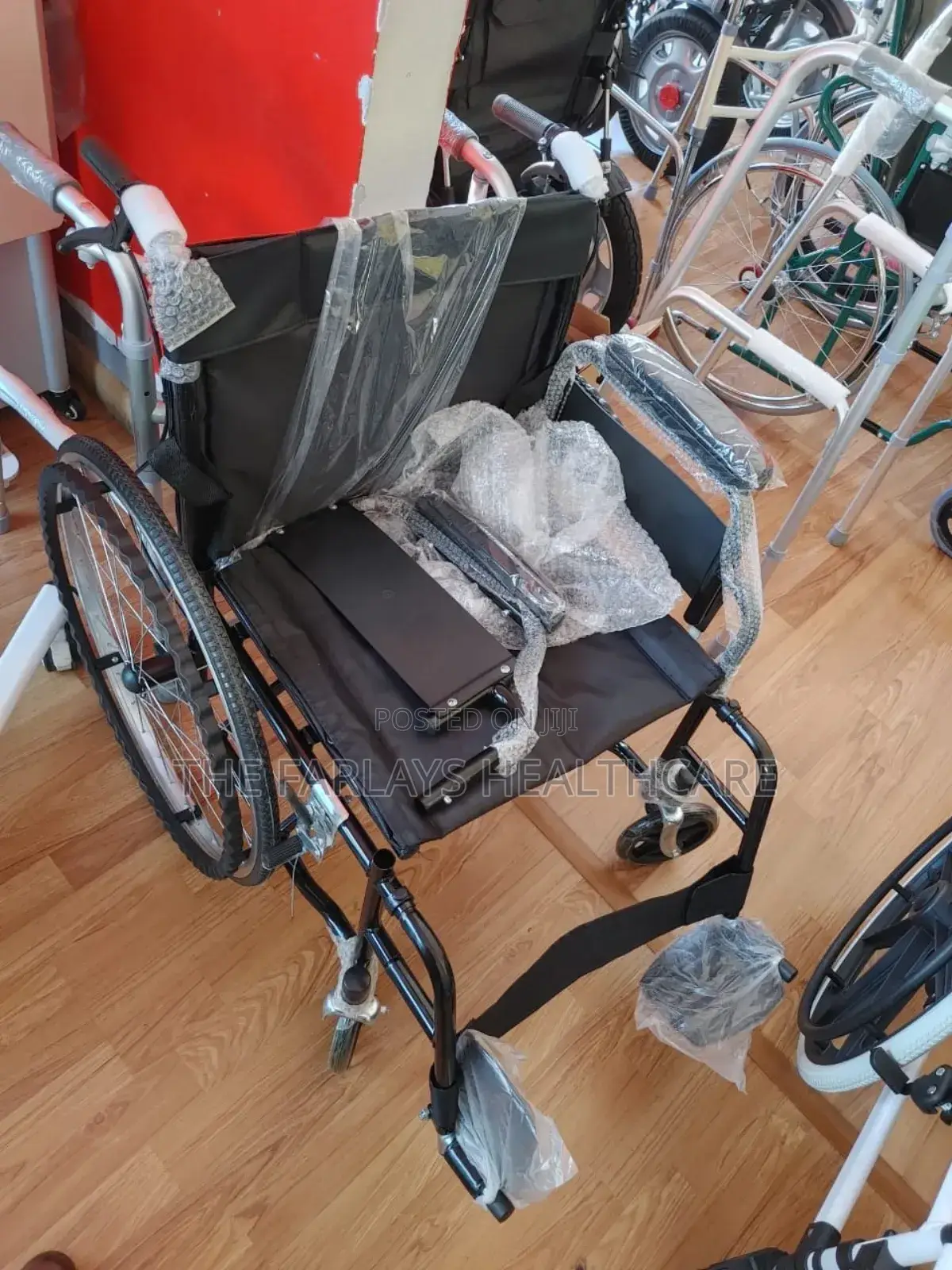 Standard Wheelchair With Hand Brakes and Push Brakes.