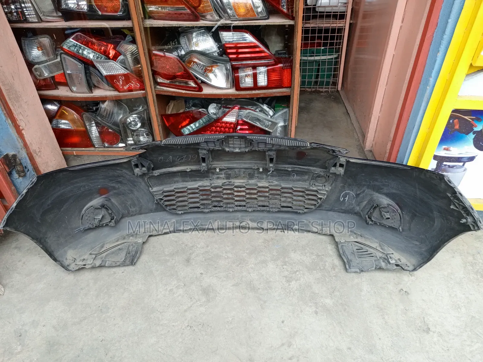 Demio 2009 Front Bumper Complete With Grill