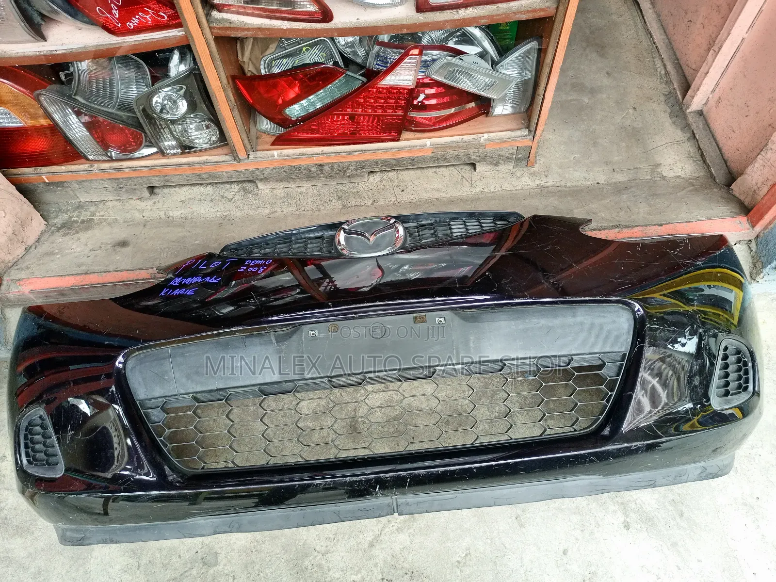 Demio 2009 Front Bumper Complete With Grill