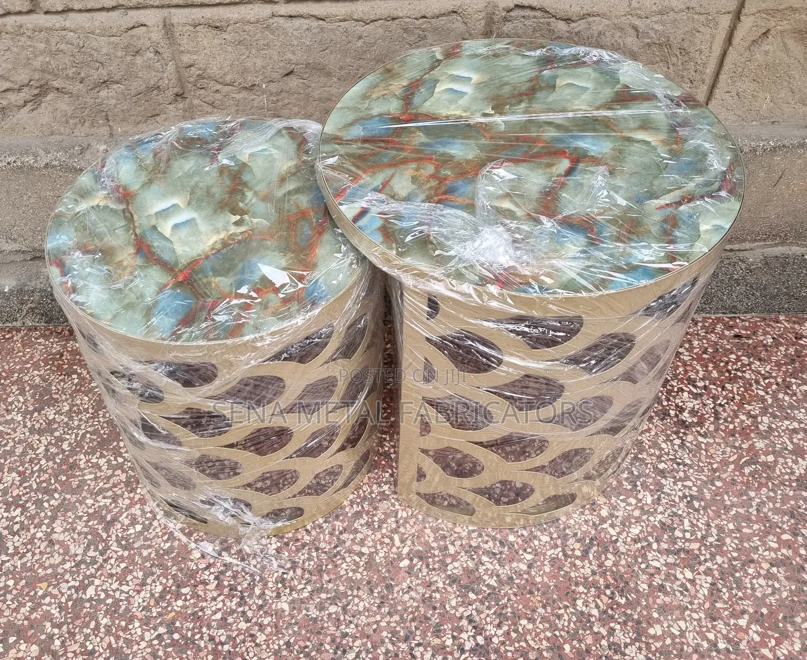 Nesting Stools With Laser-Cut Designs in Gold Colour.