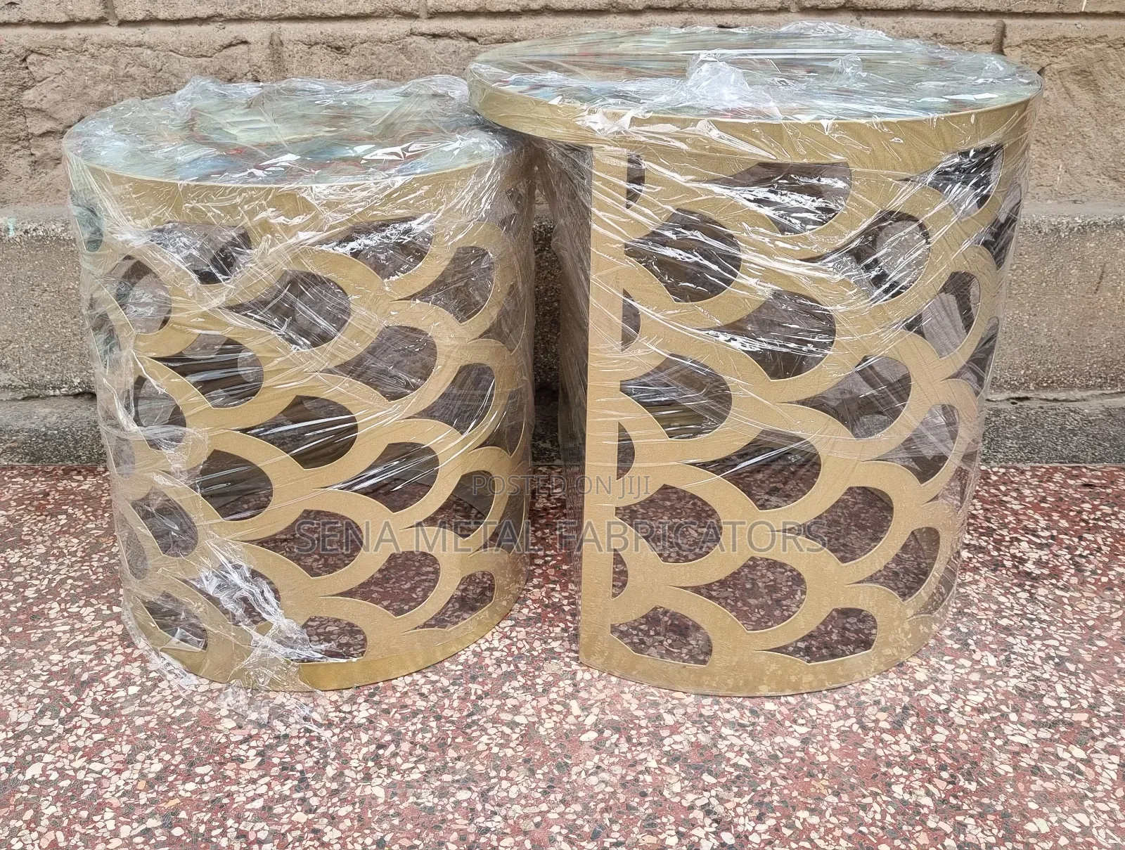 Nesting Stools With Laser-Cut Designs in Gold Colour.