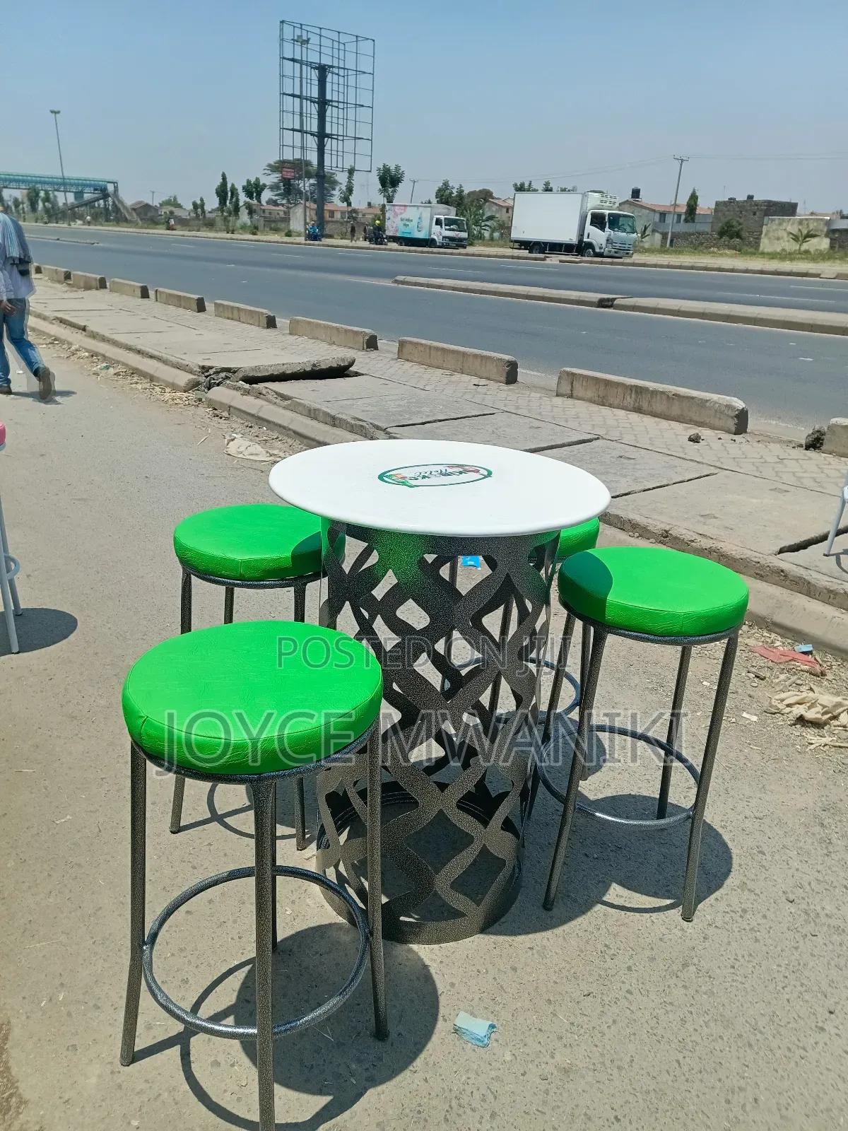 A Set of 4 High Backless Stools and a Table 
