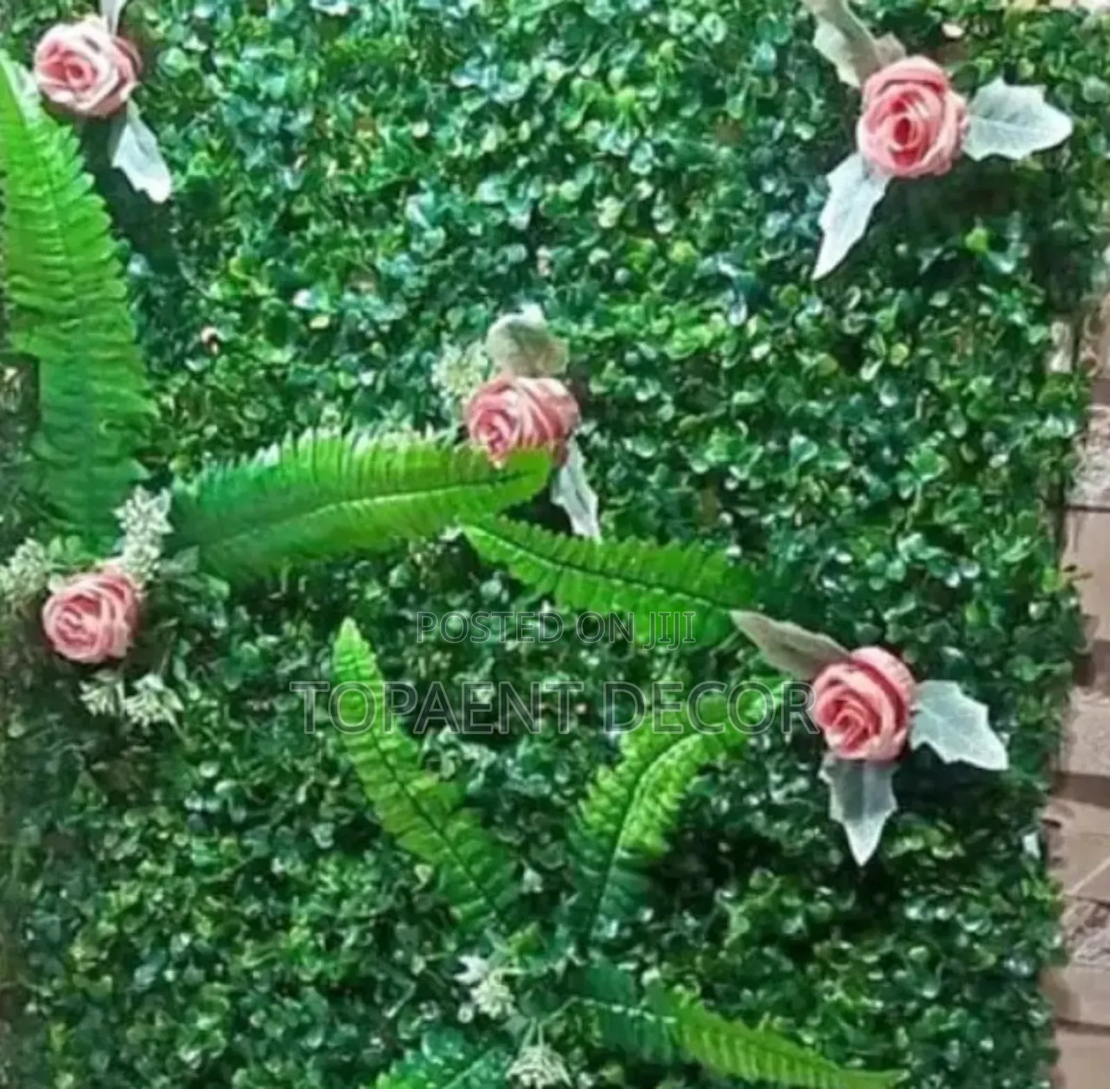 Green Boxwood Hedge Panels With Pink Flowers