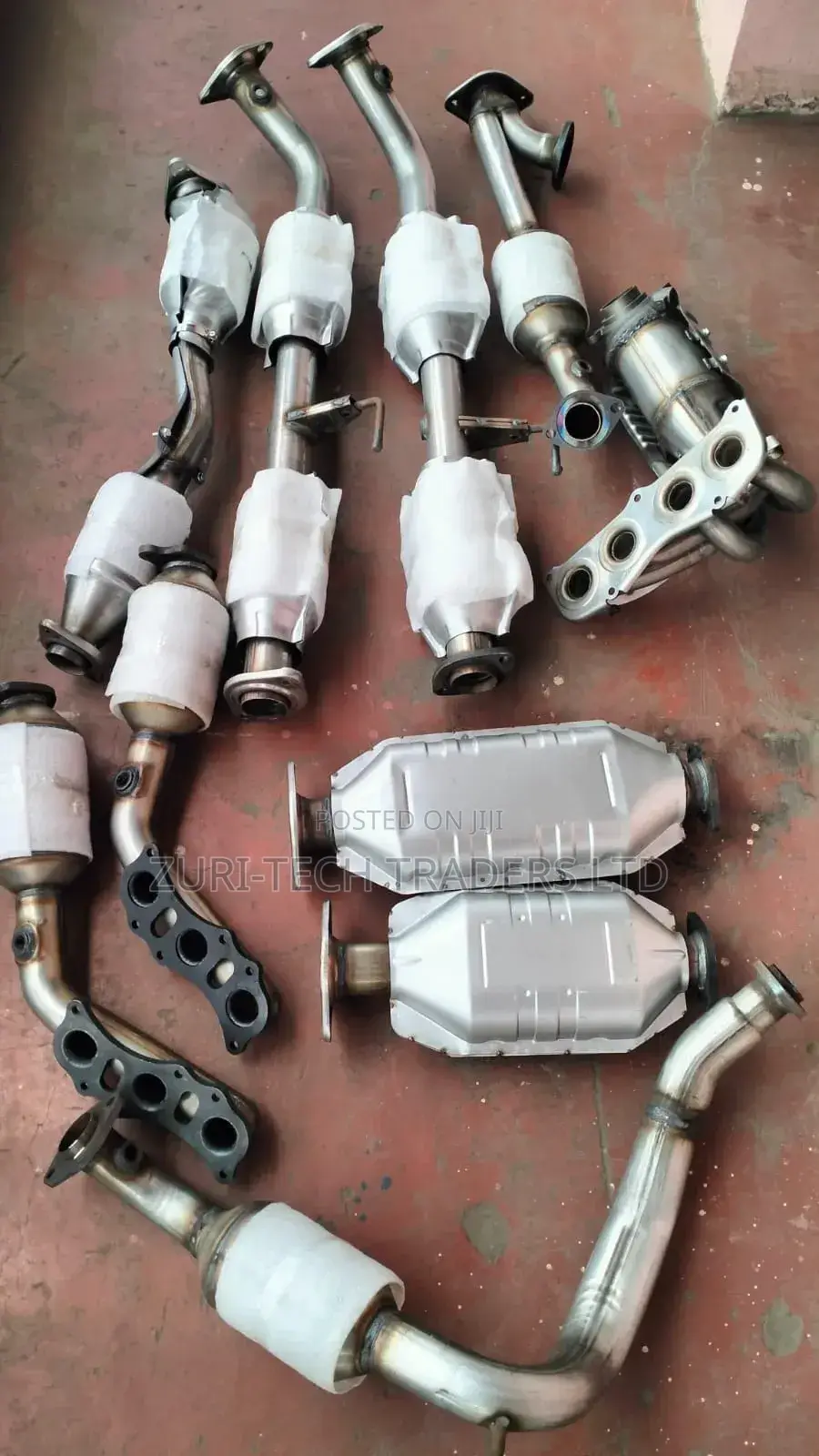 Exhaust Manifolds With Mufflers