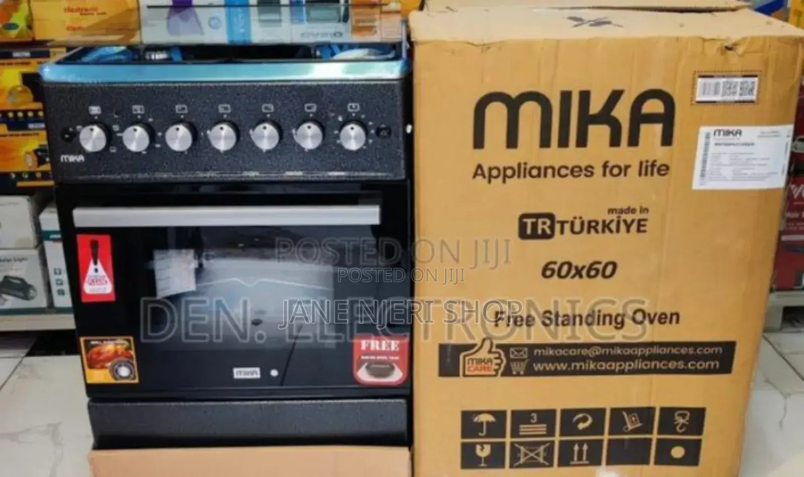 Mika 60 by 60 Cooker 3+1 With Hot Plate Na D Electric Oven