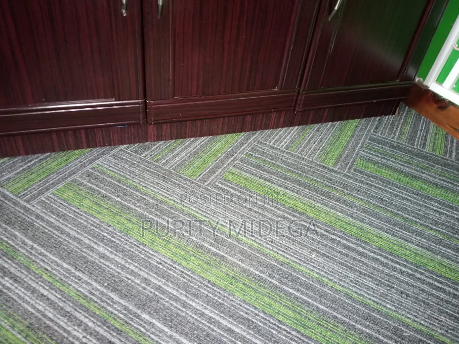 Green and Shed of Grey Carpet Tiles