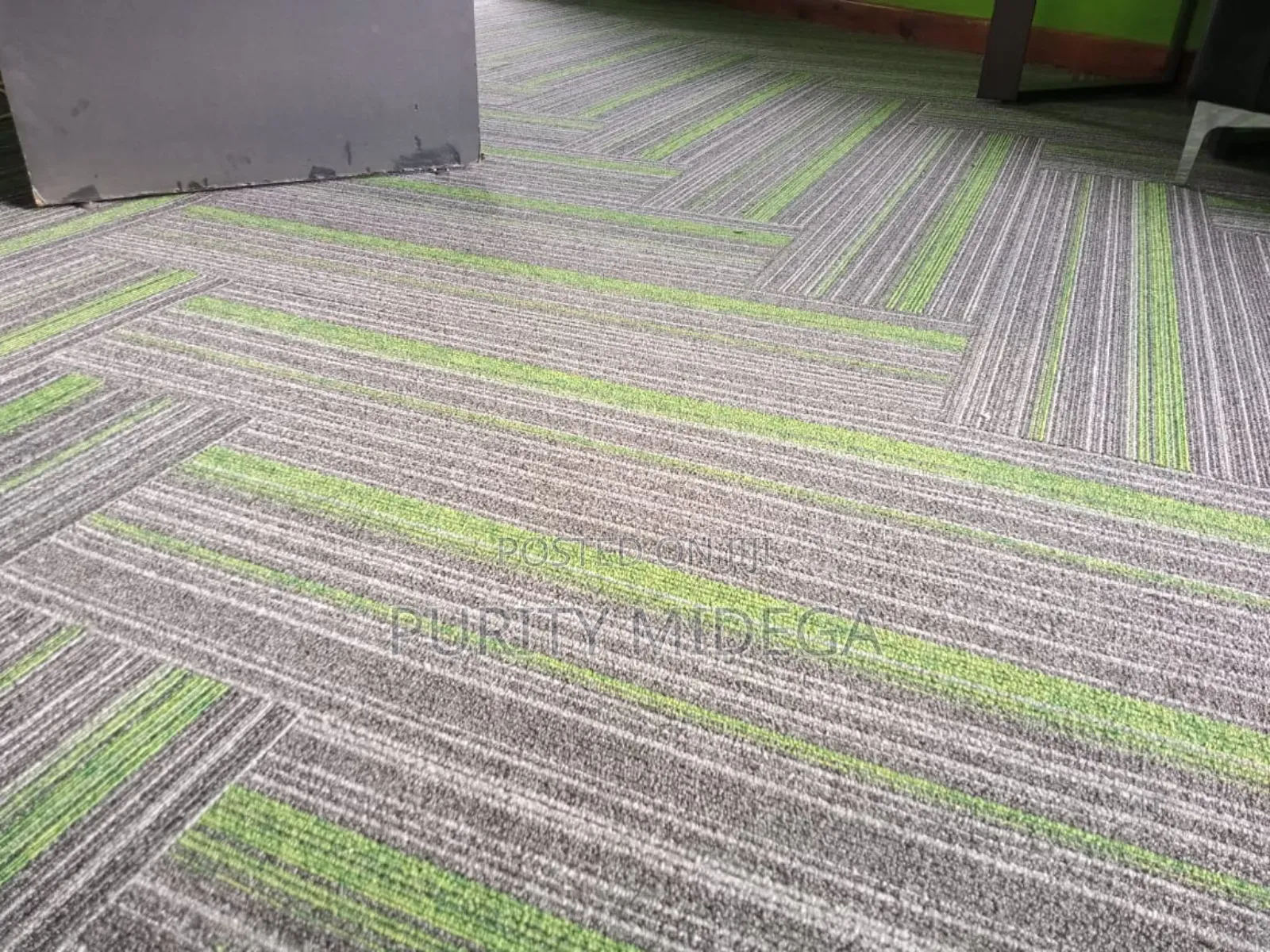 Green and Shed of Grey Carpet Tiles