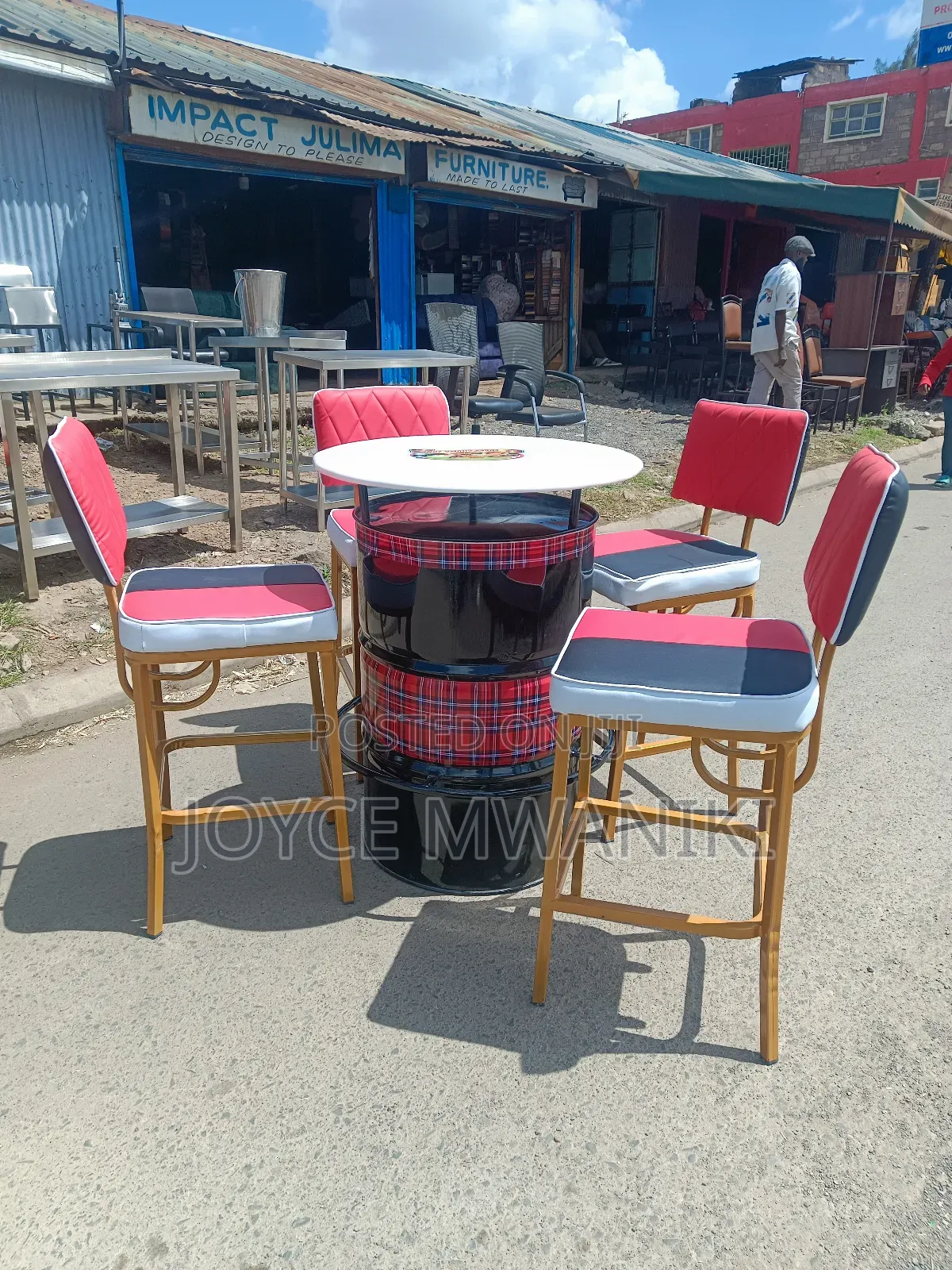 Bar Set of High Chairs and a Drum Table ,