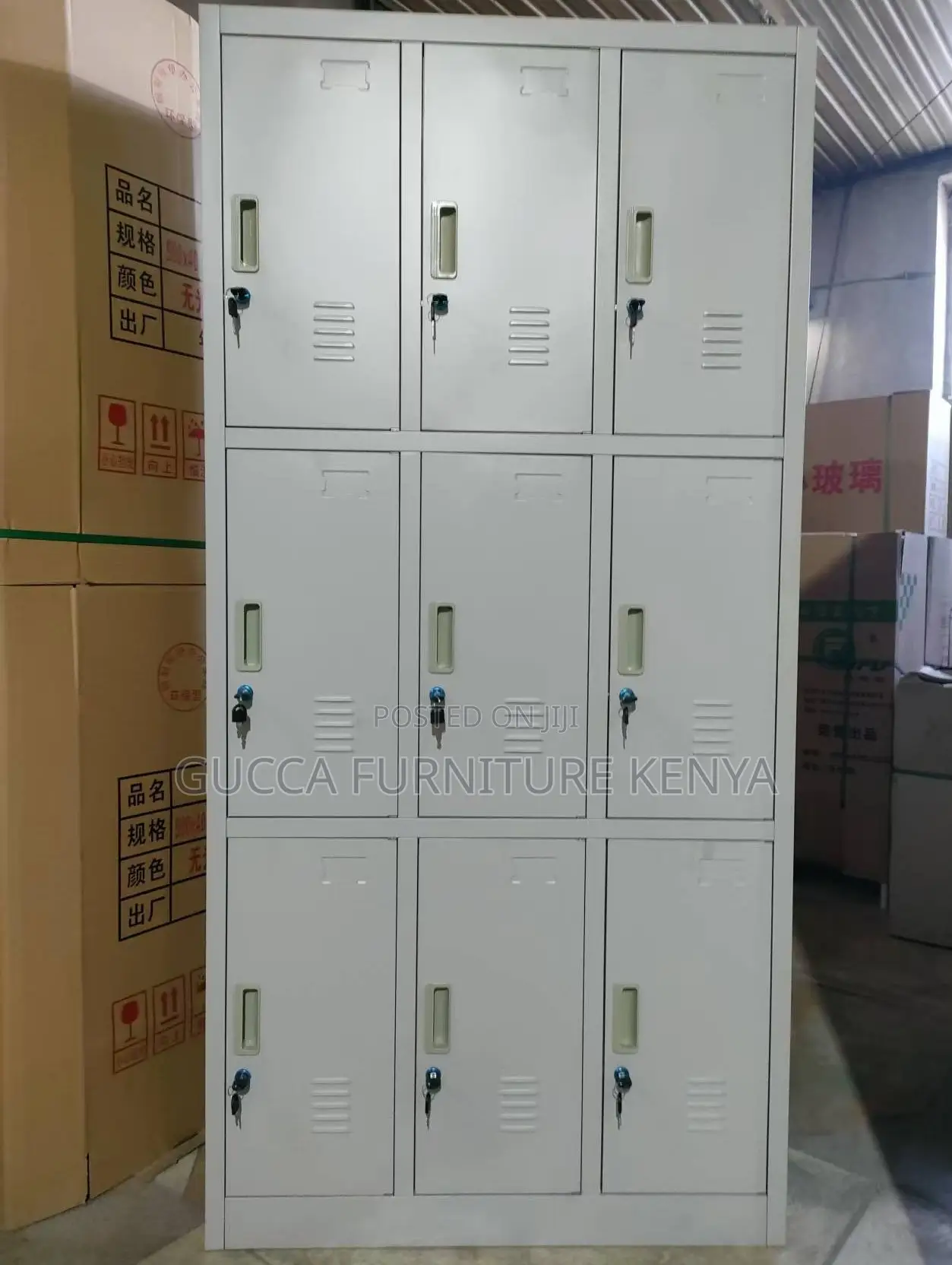 Cabinets: Metallic Vertical Nine-Door Locker Storage Unit