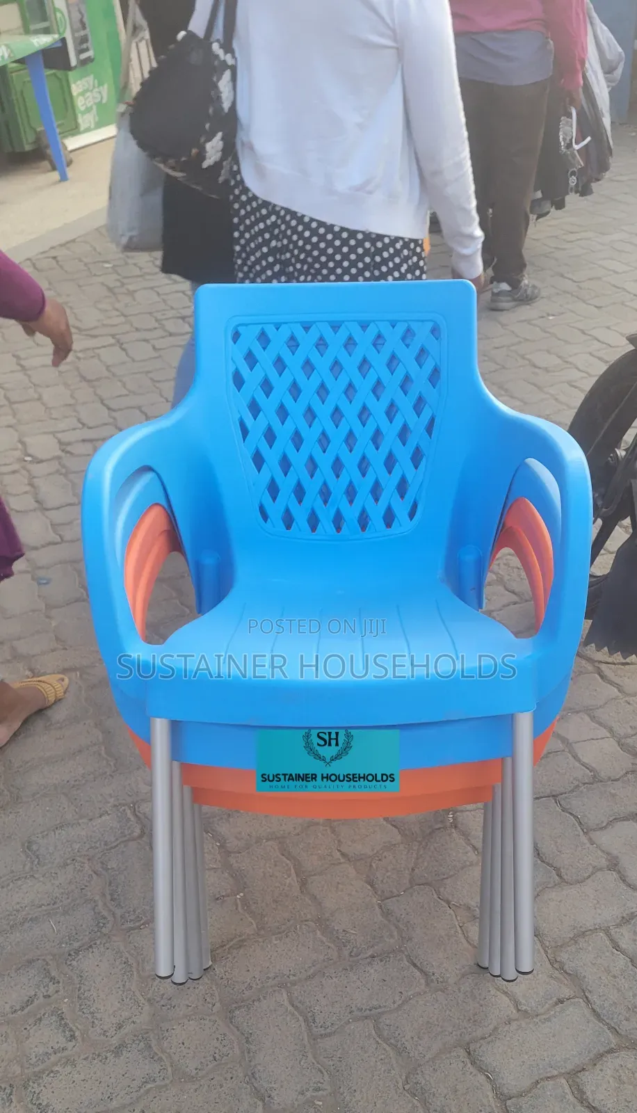 Orange and Blue Plastic Chairs With Chrome Legs