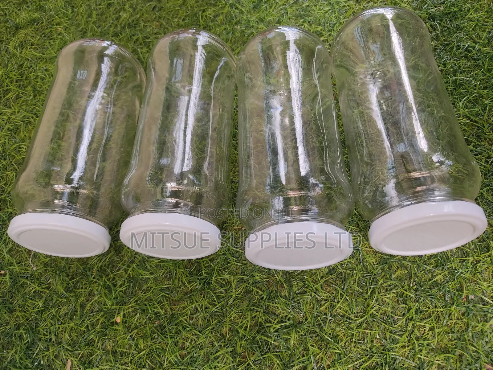 A Set of 12 Glass/Spice Jars 580ml Long With Black/White Lid