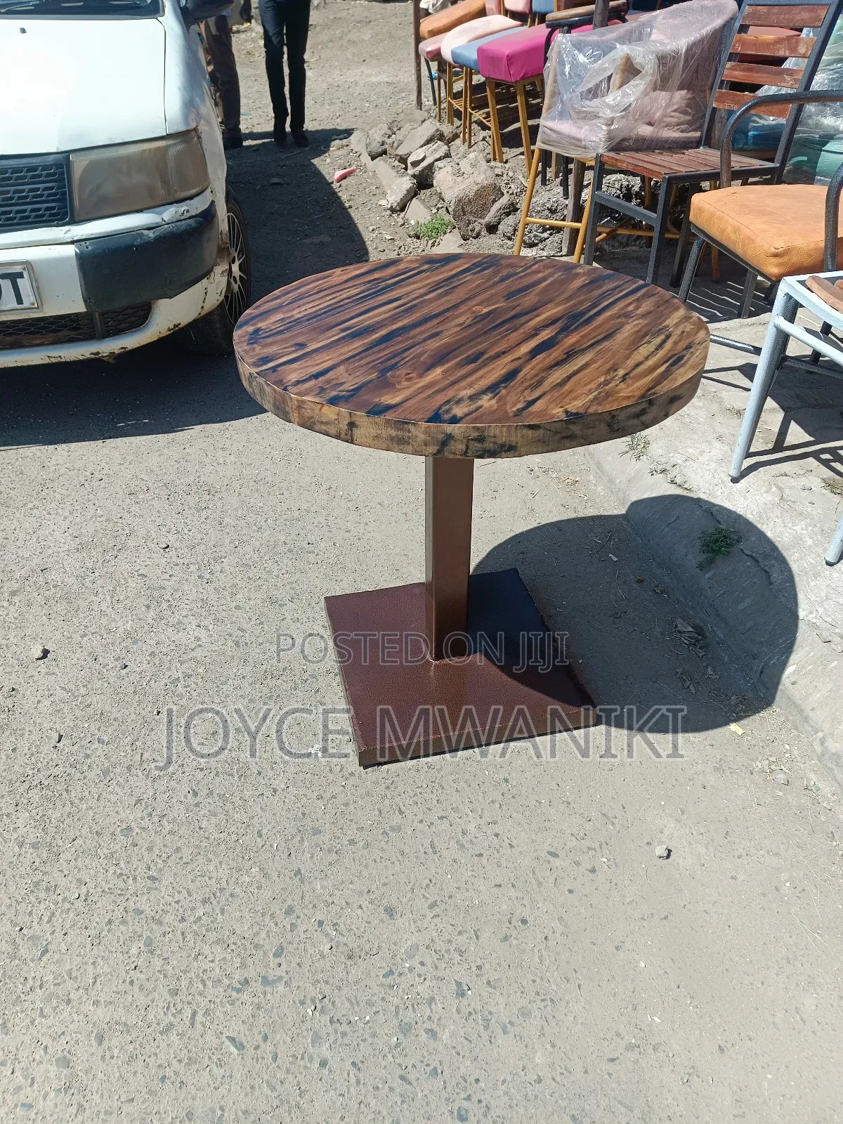 Round Restaurant Wooden Table With a Rustic Finish 