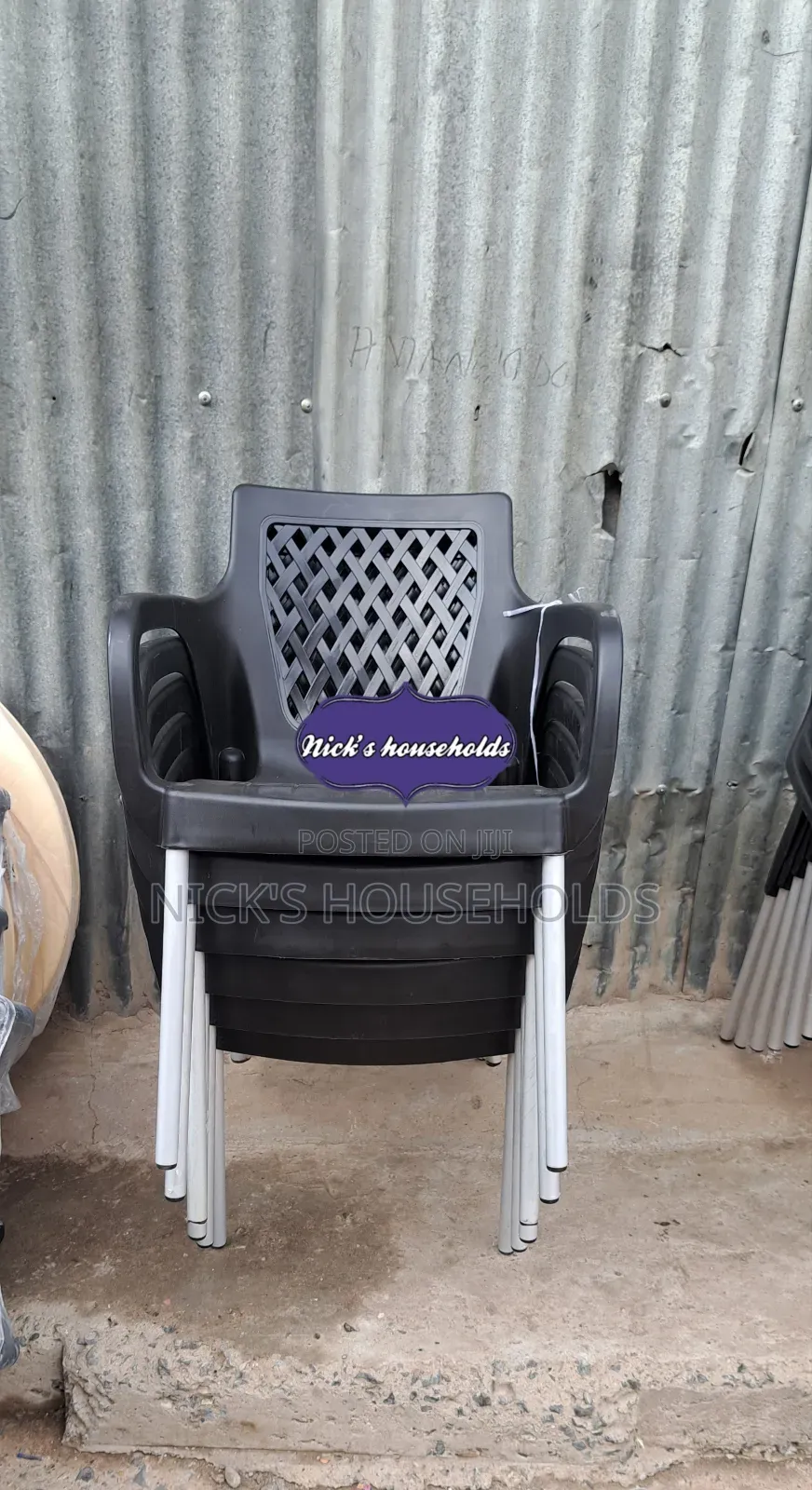 Chair With Metal Legs and Black Plastic Backrest