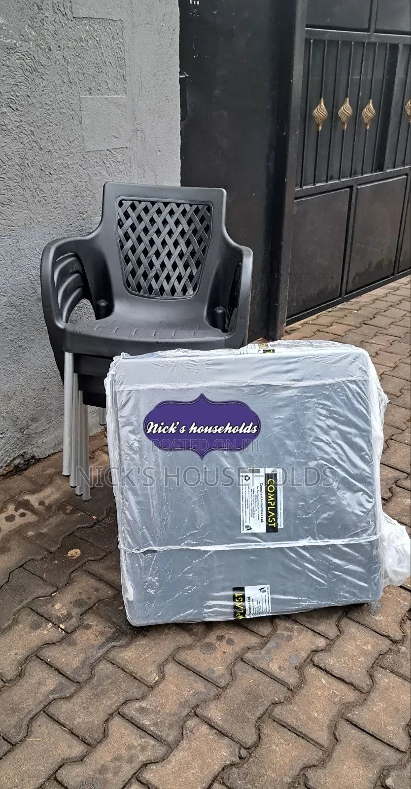 Black Square Table With 4 Plastic Chairs With Metal Legs
