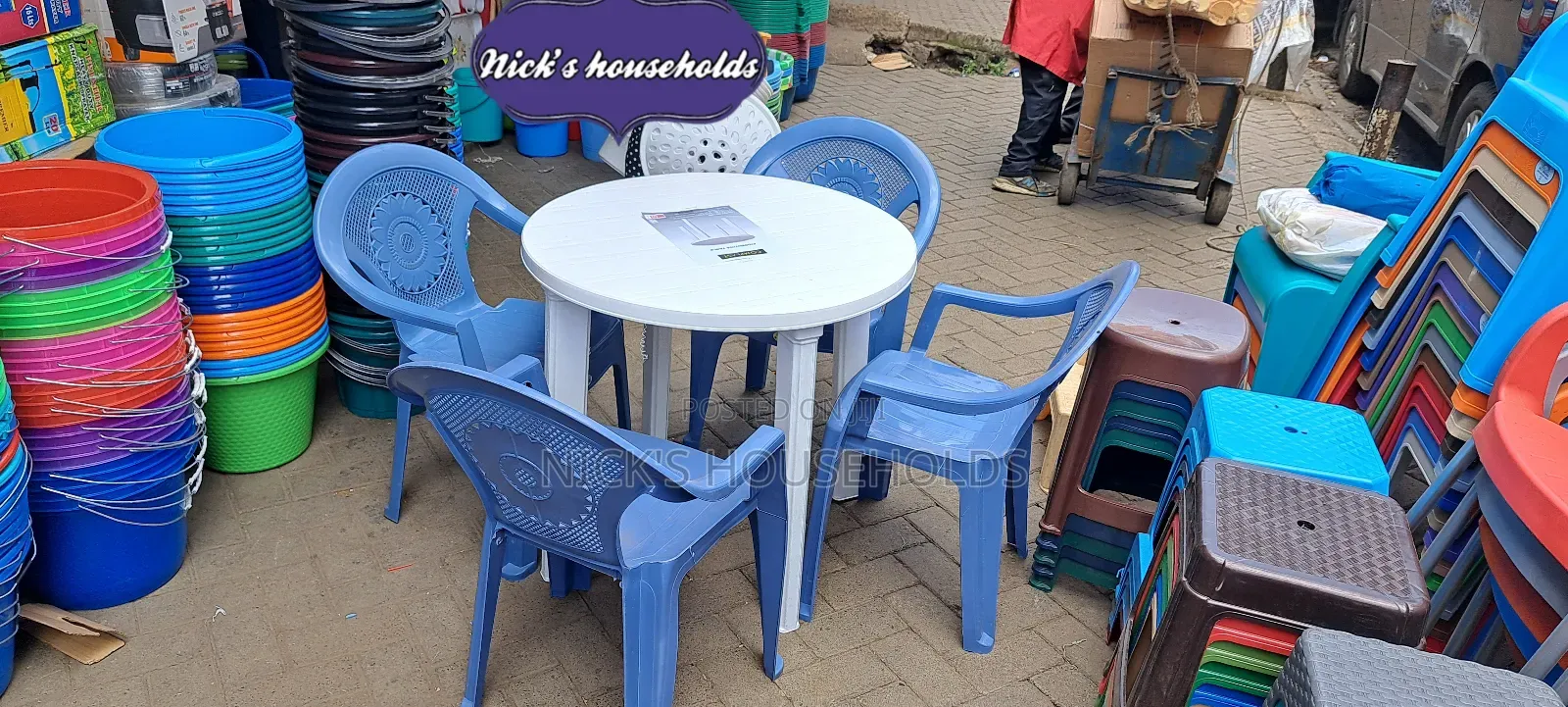 Round Plastic Table With Four Plastic Chairs Set