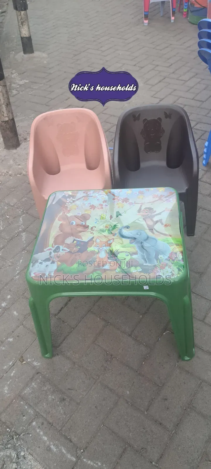 Child Plastic Chairs and a Table Set