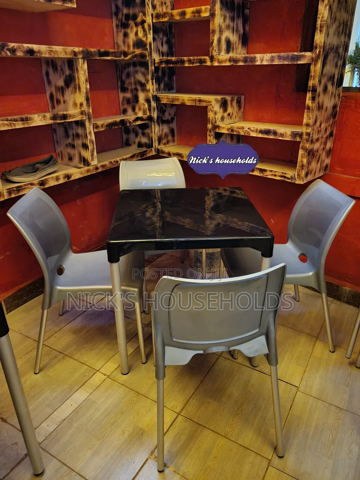 Complast Armless Plastic Chairs With a Square Plastic Table