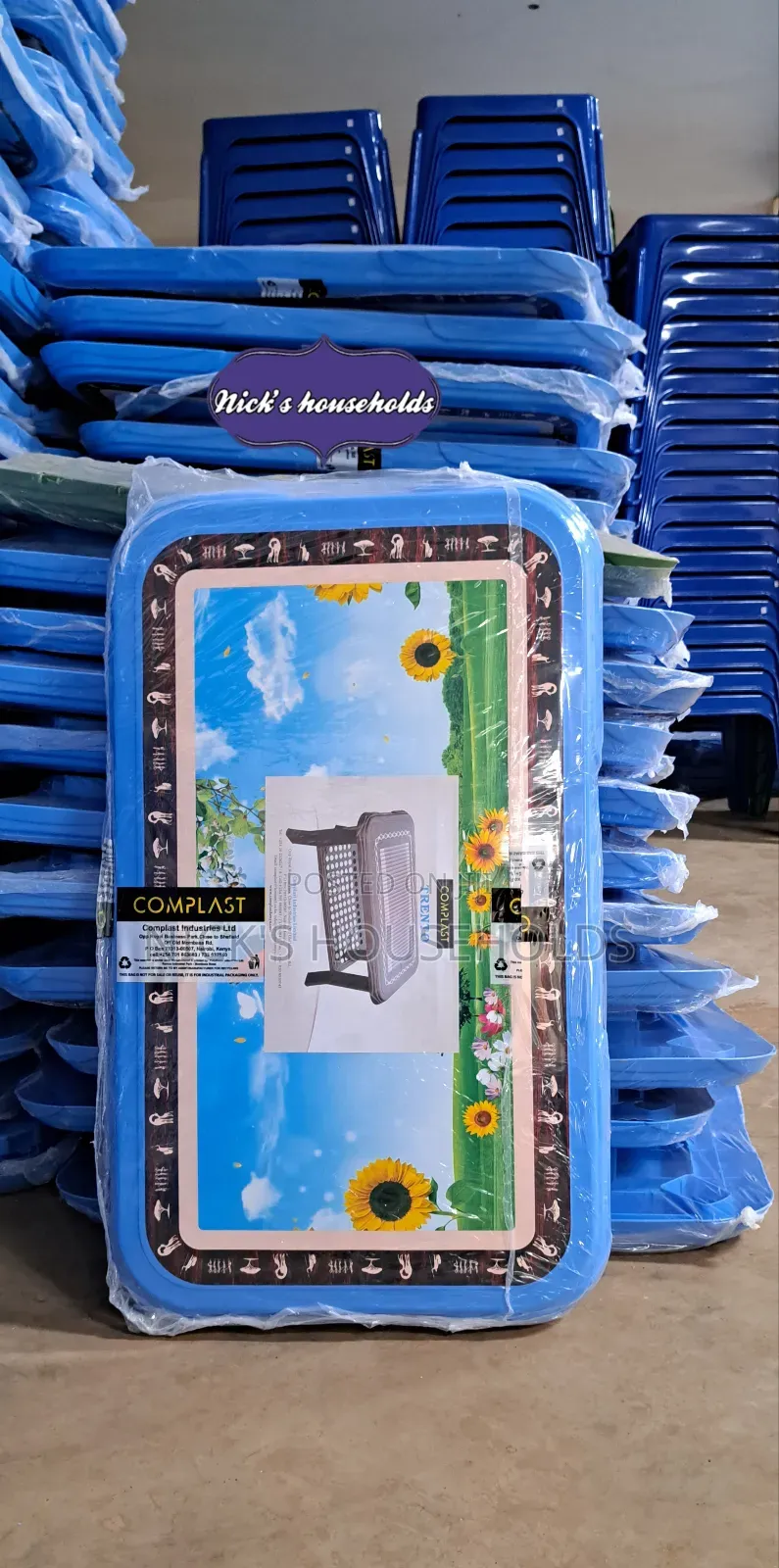 Complast Rectangular Plastic Table With a Flower