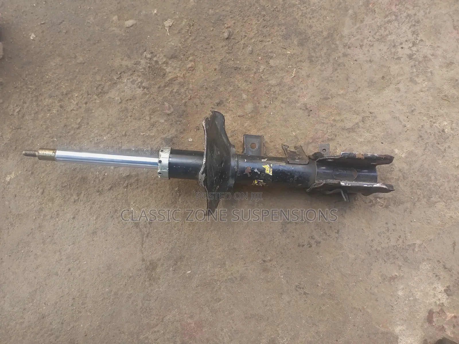 Nissan England Front Shock