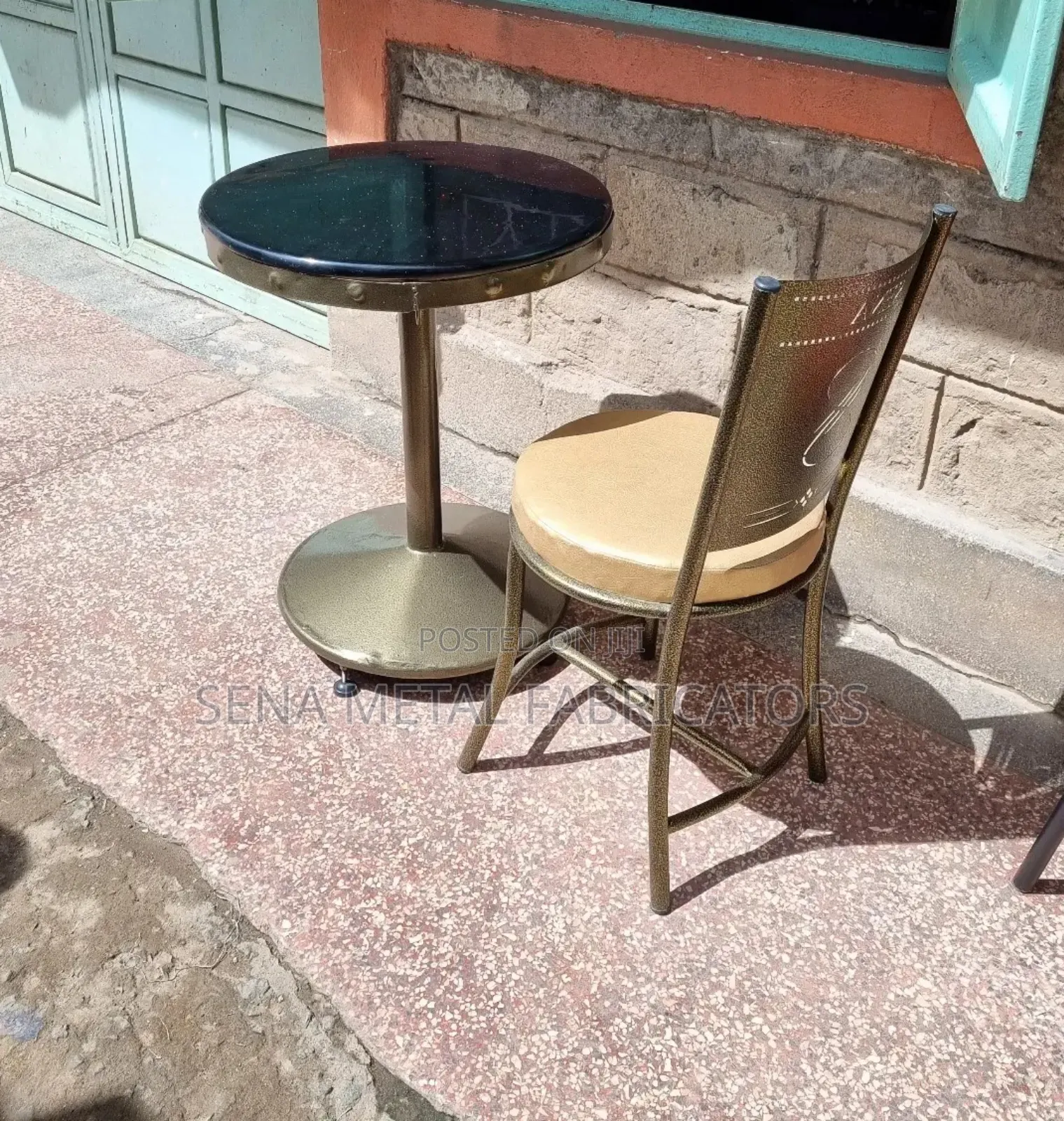 Restaurant Table With Black Marble Top.