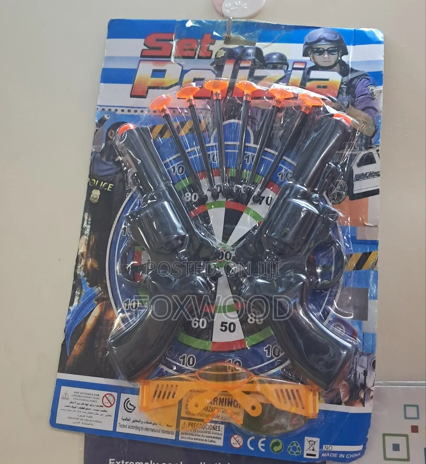 A Toy Police Set, Including Toy Guns and Darts