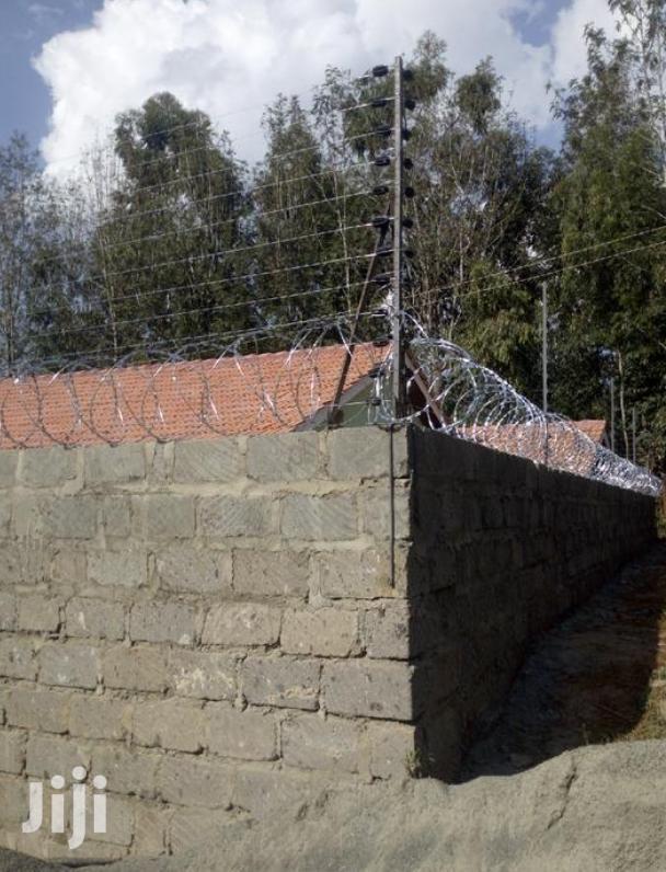 Electric Fence Installation Comes With Razor Wire