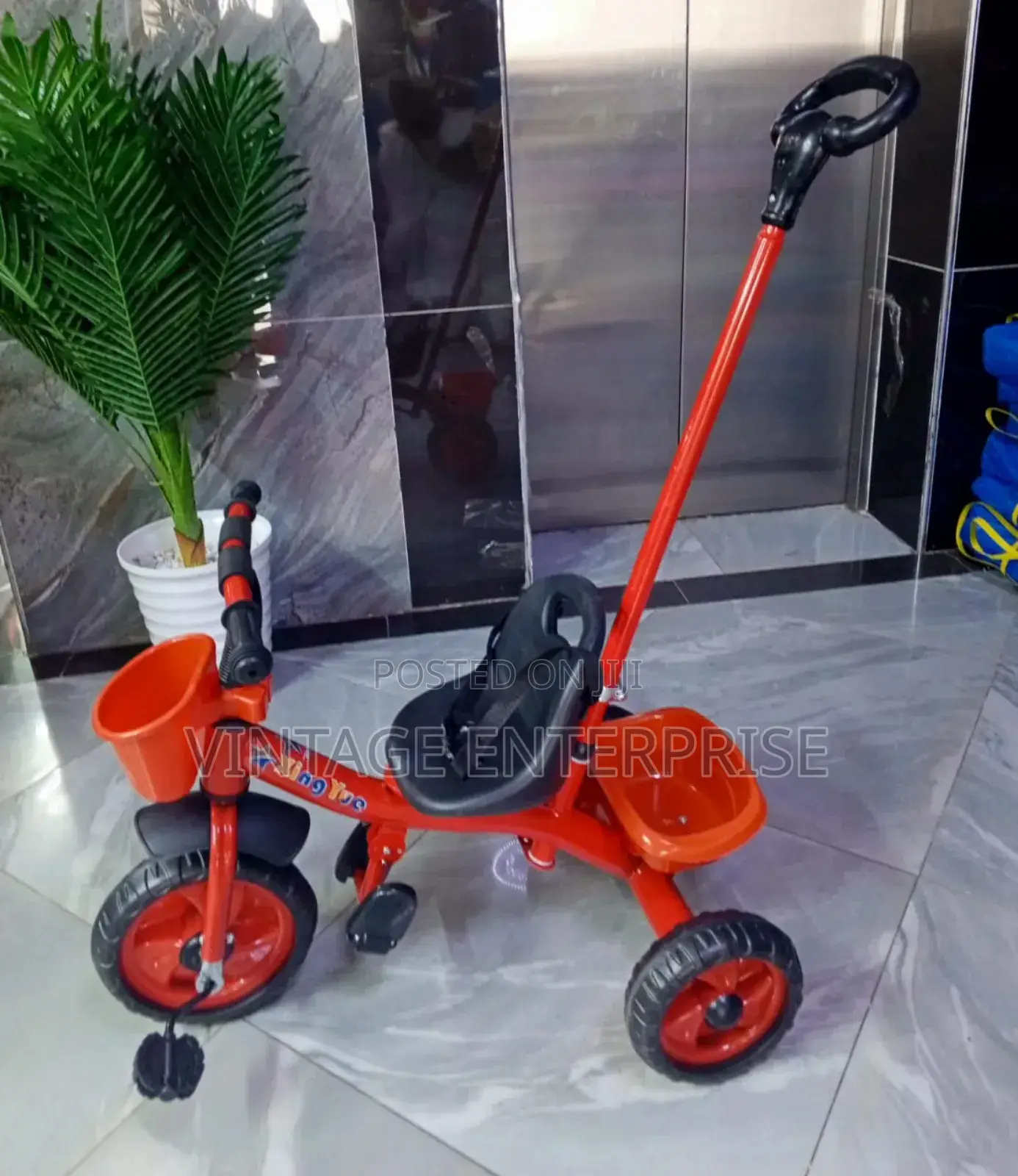 Tricycle With Push Handle