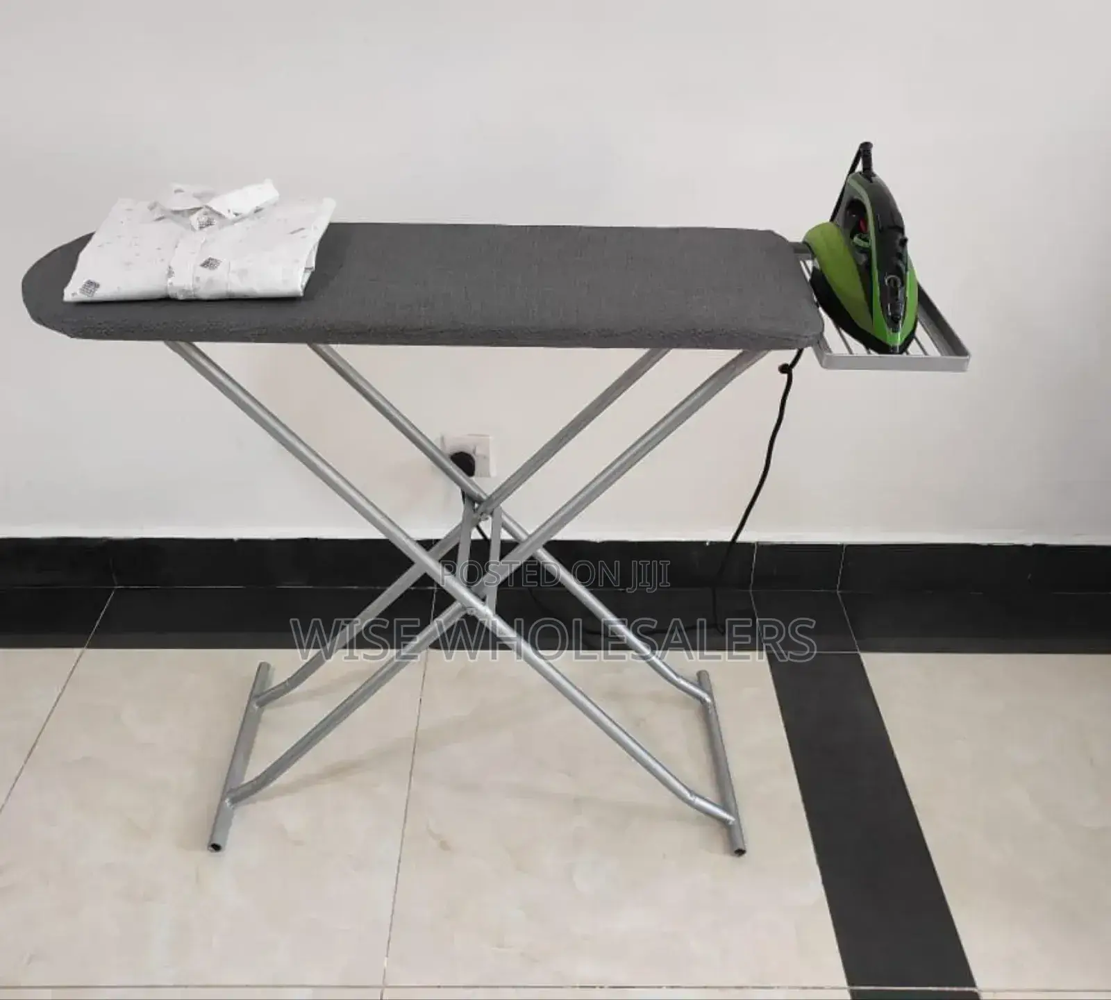 *Metallic Ironing Board*

Sturdy And Durable Construction