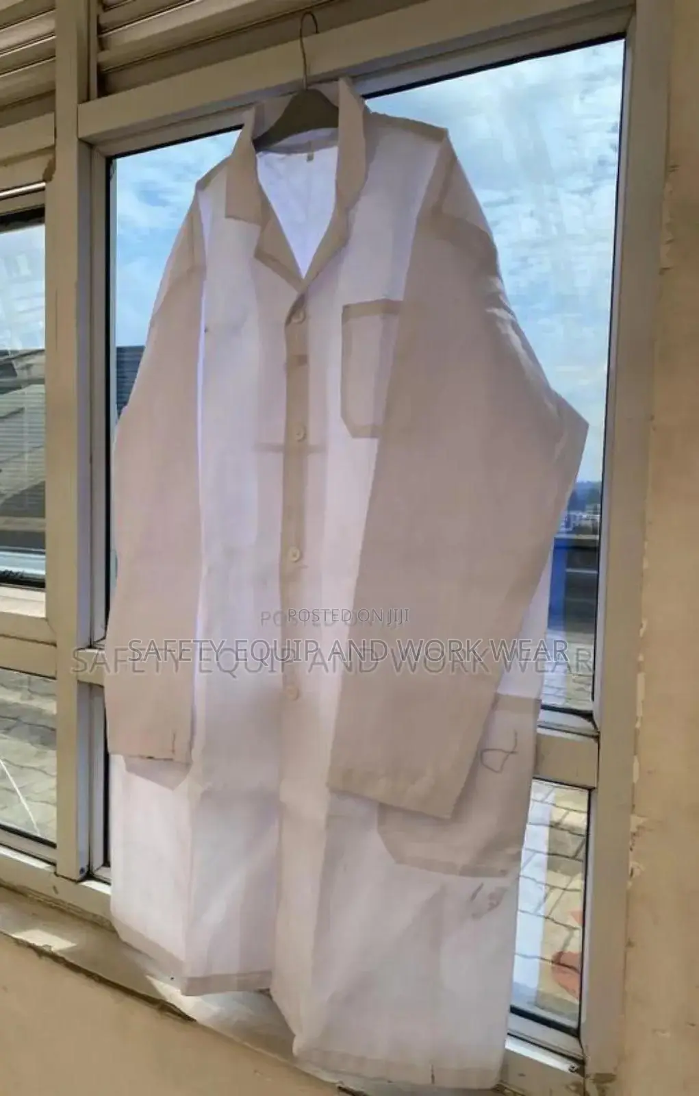 White Safety Lab Coats For School Science Labs.
