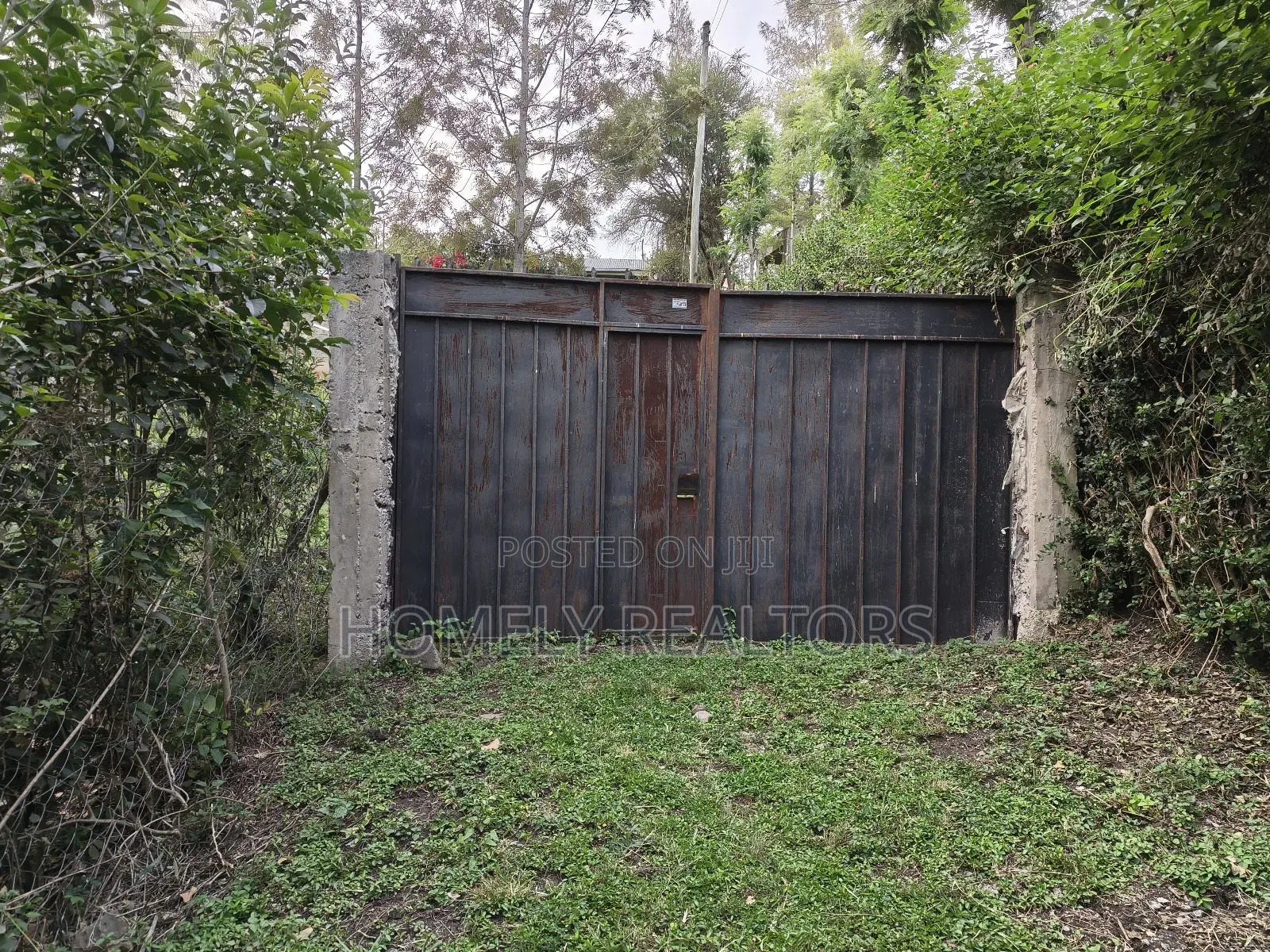Quarter Acre Gated Corner Plot in Rimpa, Rongai With a House