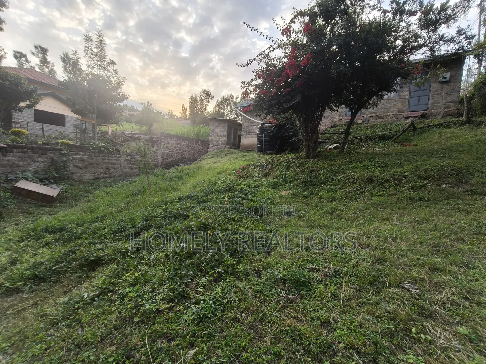 Quarter Acre Gated Corner Plot in Rimpa, Rongai With a House
